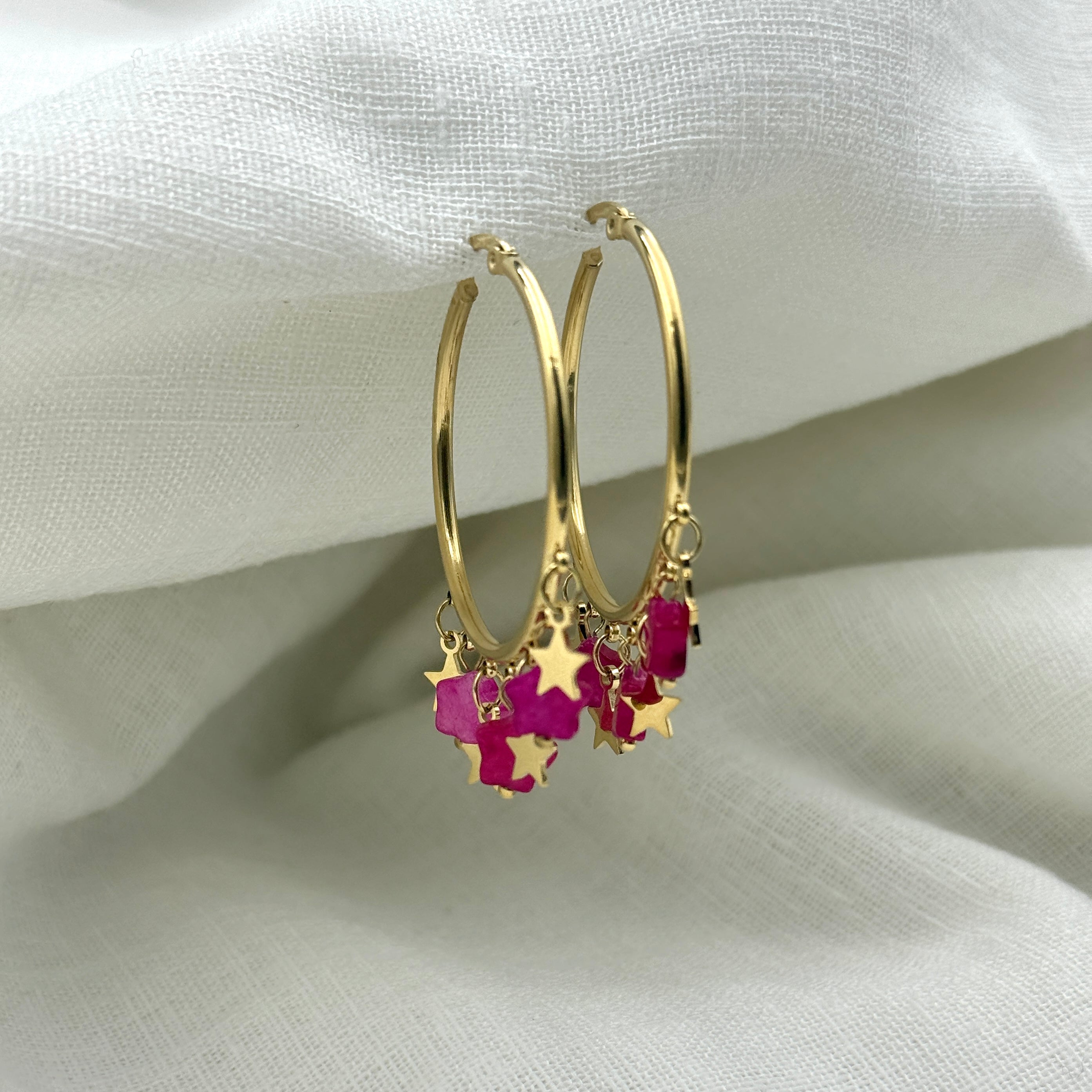 Oorbellen floating pink stars