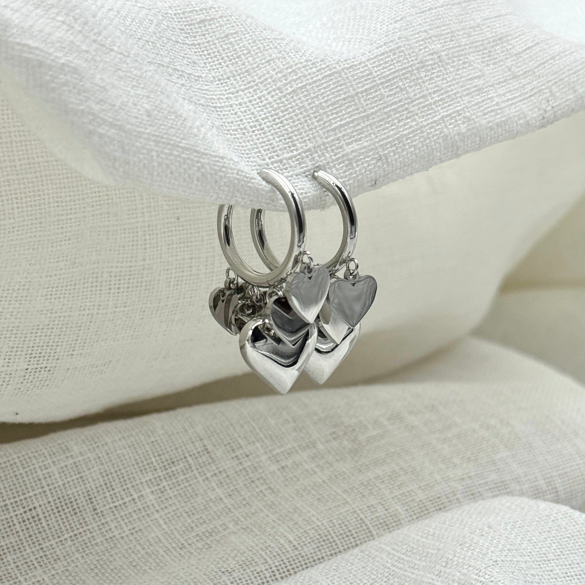 Oorbellen hanging hearts zilver