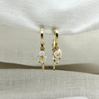 Oorbellen hangende hartjes met love bedels