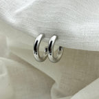 Oorbellen basic zilverkleurige halve hoops 2.5 cm